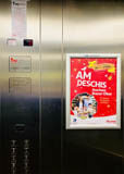 Publicitate in lift, Auchan